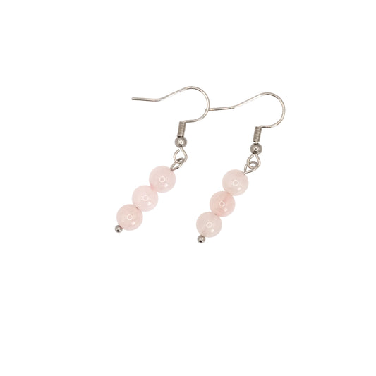 Boucles d'oreilles boules pendantes en quartz rose du Brésil.