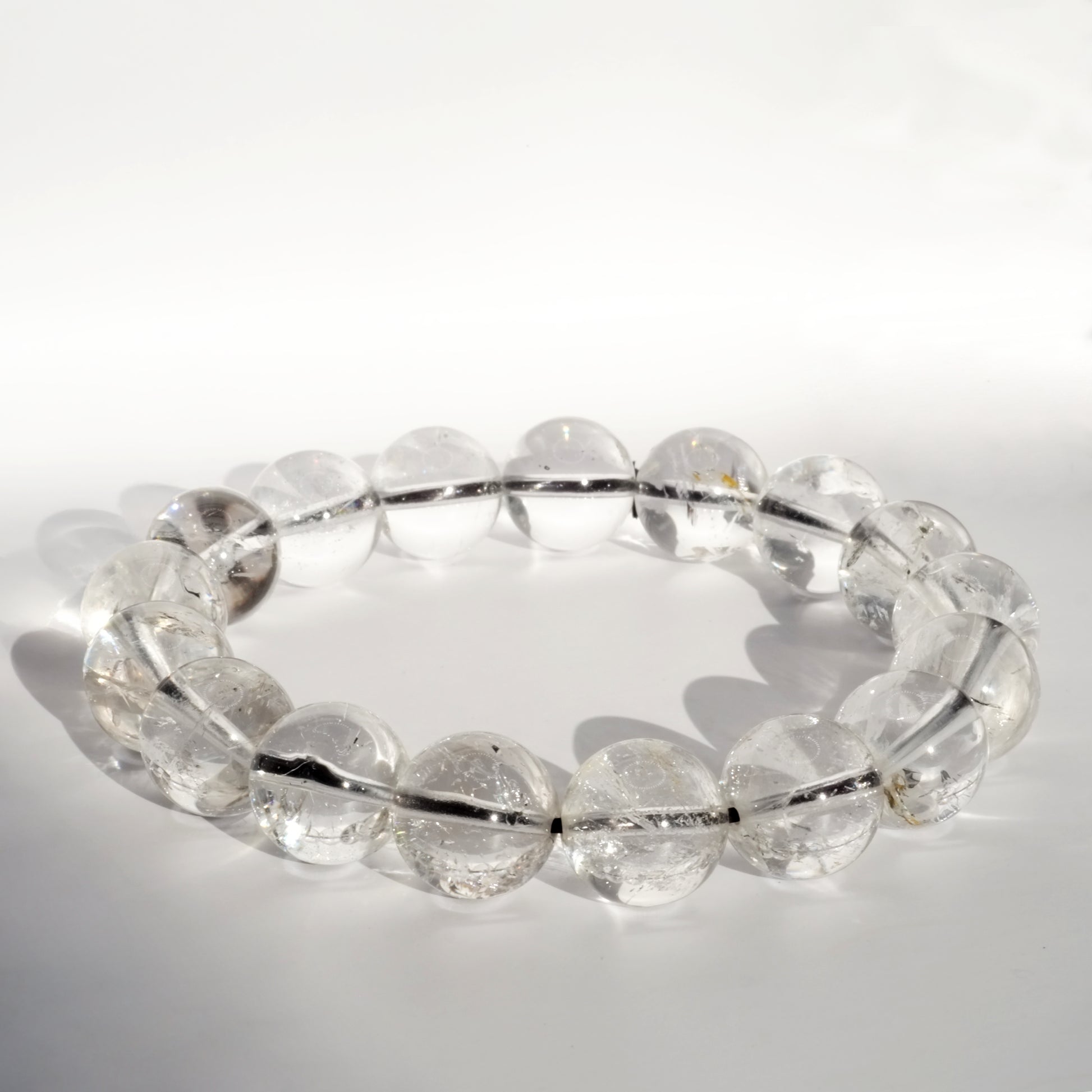 Bracelet boule cristal de Herkimer AAA 12mm à la lumière du soleil